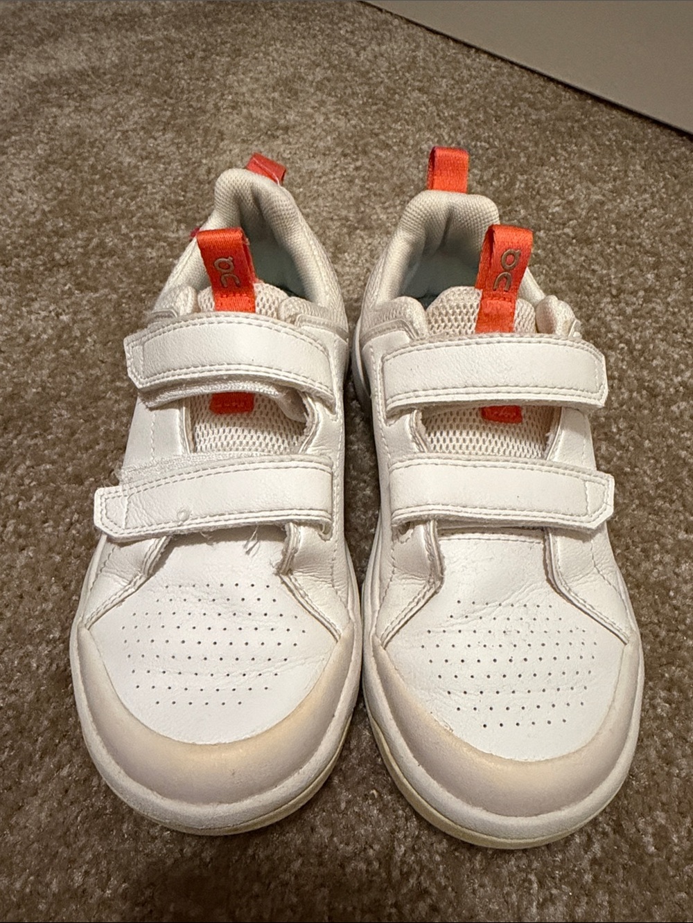 On Kids The Roger White Sneakers with Orange Pull Tabs and Dual Straps